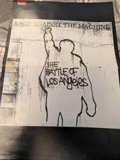 Listing image for RAGE AGAINST THE MACHINE- BATTLE OF LOS ANGELES DOUBLE PAGE MUSIC PRESS POSTER